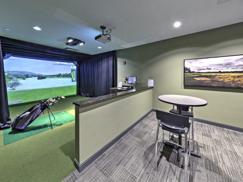 This image shows the virtual-reality golf simulator that will improve your game.